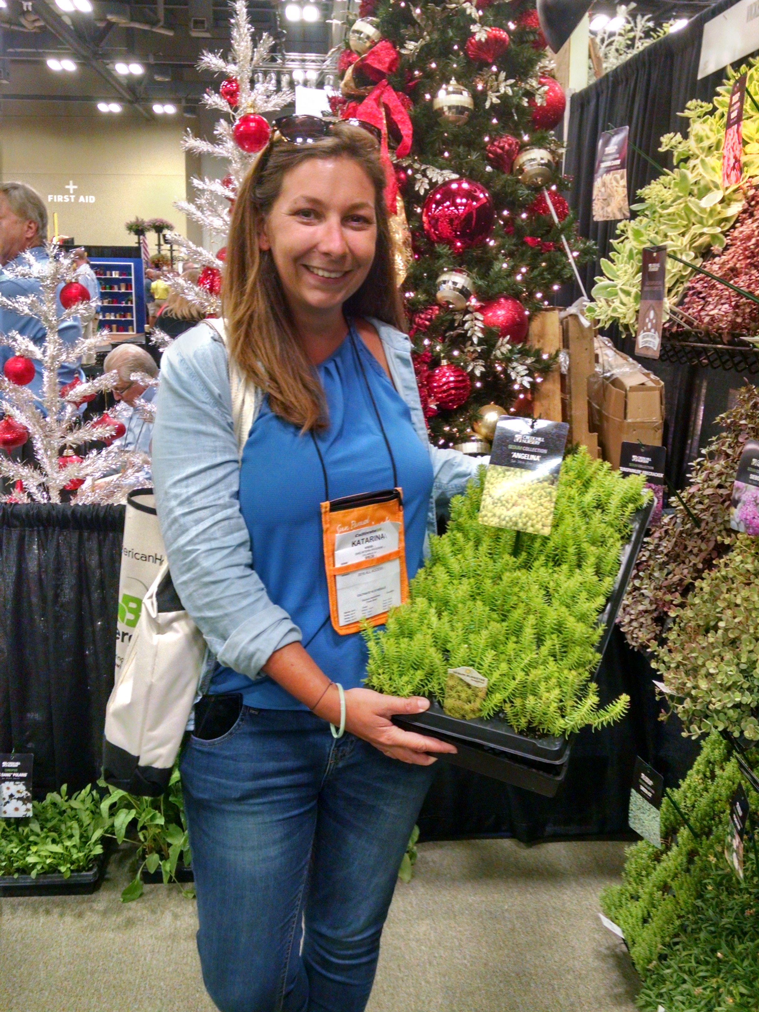 Katya with her dad’s selection of Angelina Sedum,  a perennial succulent plant.